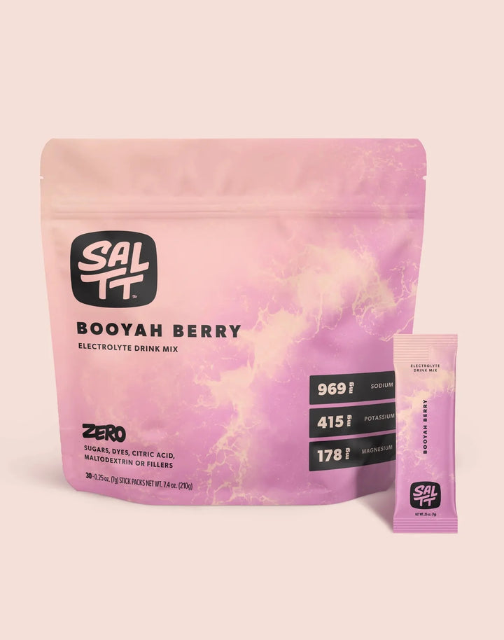 Booyah Berry Electrolyte Drink Mix - 30 Sticks by SALTT in pink packaging showing electrolyte mineral content details