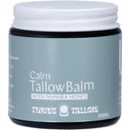 Calm Tallow Balm - 100ml by Thrive Tallow in dark jar with white lid featuring skincare balm label and manuka honey ingredient text