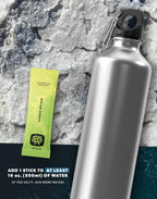Citrus Splash Electrolyte Drink Mix - 30 Sticks by SALTT shown next to silver water bottle on textured surface