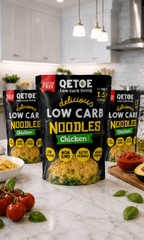 Packages of QETOE low carb noodles on a kitchen counter with ingredients.