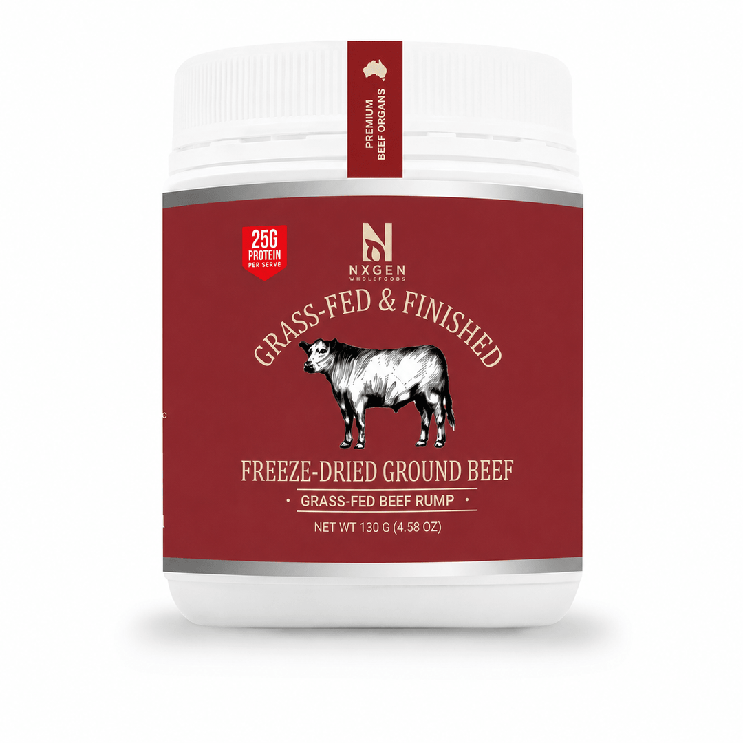 A white plastic tub of Nxsen Premium Beef Goulash with a deep red label featuring a black and white cow illustration and text reading 'Grass-Fed & Finished Freeze-Dried Ground Beef'.