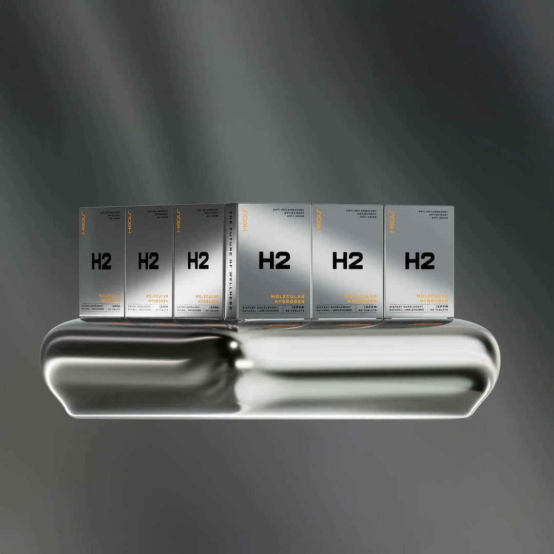 H2 Hydrogen Water - Unflavoured - 30 Tablets by Healr displayed with metallic silver packaging on reflective surface
