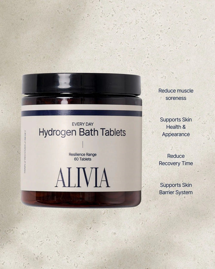 Alivia Hydrogen Bath Tablets - 60pk in amber jar with black lid, promoting muscle relief and skin health benefits.