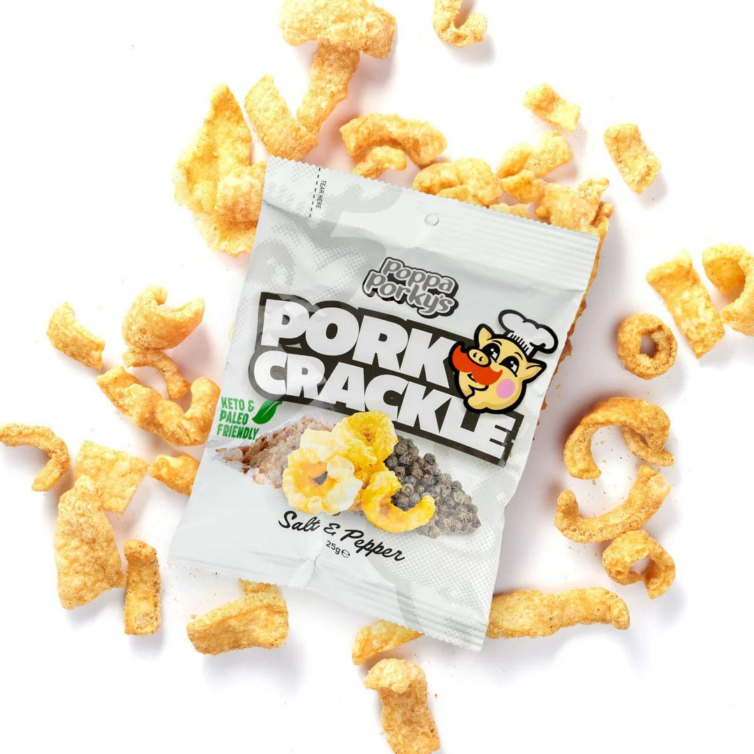 Poppa Porky’s Pork Crackle - Salt & Pepper - 25g bag surrounded by crunchy pork crackle pieces in white background.