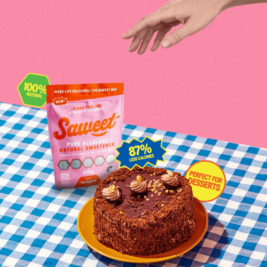 Pure Allulose Natural Sweetener Granules 200g by Saweet Way next to a chocolate cake on a blue checkered tablecloth