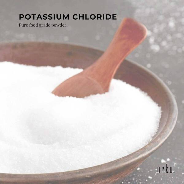 Pure Potassium Chloride Powder - 400g in wooden bowl with spoon, highlighting white food grade salt by Orku.