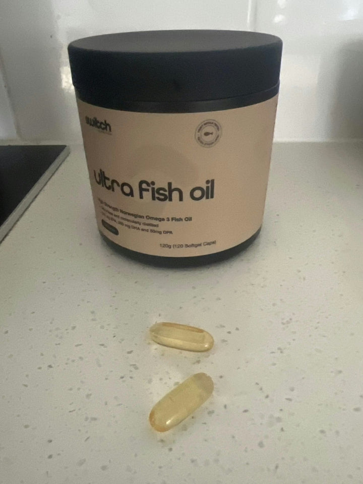 Ultra Fish Oil High Strength Norwegian Omega 3 - 30 Caps container with two softgel capsules by Switch Nutrition New Arrivals collection