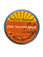 Round metal tin of Zinc Tallow Balm - 130g by Barefoot Skincare Co with orange tropical sunset label design